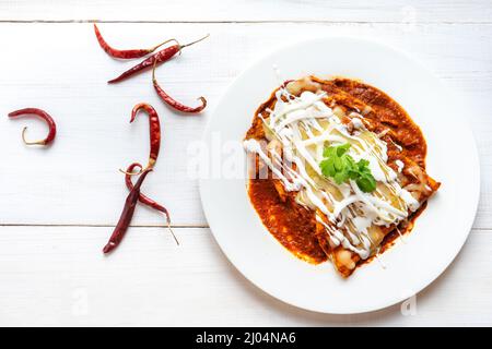 Traditional mexican red enchiladas Stock Photo