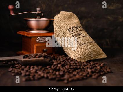 Coffee bean in bag, coffee grinder with scoop Stock Photo