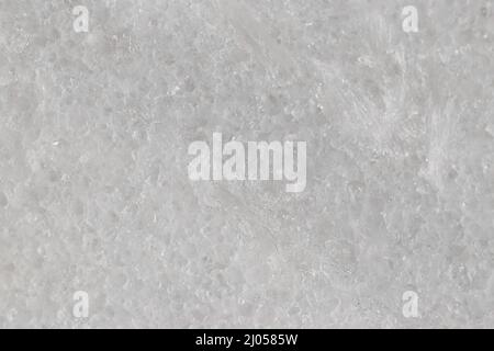 Natural stone tile in light gray color with scratches and marble effect. Stock Photo