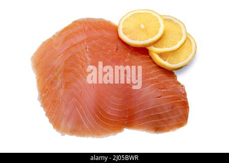 Smoked salmon slices with lemon slices isolated on white background, top view, flat lay Stock Photo
