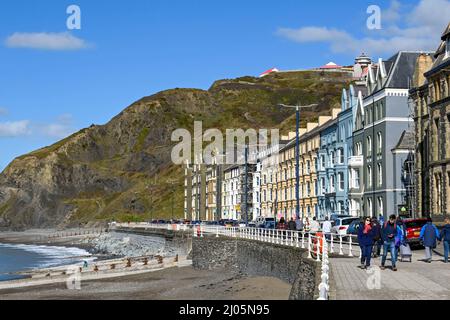 Aberystwyth, Wales - March 2022: Row of traditional terraced houses on the town's seafront. Stock Photo