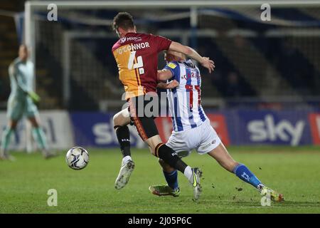 HARTLEPOOL, UK. MAR 15TH Paudie O'Connor of Bradford City battles for possession with Hartlepool United's Marcus Carver during the Sky Bet League 2 match between Hartlepool United and Bradford City at Victoria Park, Hartlepool on Tuesday 15th March 2022. (Credit: Mark Fletcher | MI News) Credit: MI News & Sport /Alamy Live News Stock Photo