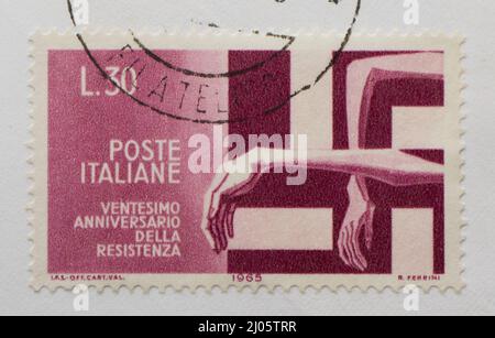 Colorful Vintage Used Postage Stamps from Italy Stock Photo