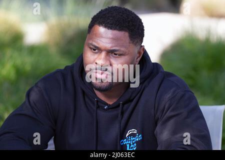 Costa Mesa, United States. 16th Mar, 2022. Los Angeles Chargers linebacker Khalil  Mack poses with No. 52 jersey at introductory press conference, Wednesday,  Mar. 16, 2022, in Costa Mesa, Calif. Photo via