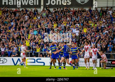 Warrington 16 July 2015: Warrington Wolves hosted St Helens at the Halliwell Jones Stadium. Wolves players celebrate a try Stock Photo