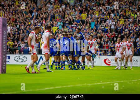 Warrington 16 July 2015: Warrington Wolves hosted St Helens at the Halliwell Jones Stadium. Wolves players celebrate a try Stock Photo