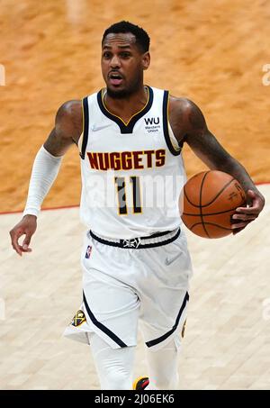 Washington, USA. 16th Mar, 2022. WASHINGTON, DC - MARCH 06: Denver Nuggets guard Monte Morris (11) moves up court during a NBA game between the Washington Wizards and the Denver Nuggets, on March 16, 2022, at Capital One Arena, in Washington, DC. (Photo by Tony Quinn/SipaUSA) Credit: Sipa USA/Alamy Live News Stock Photo