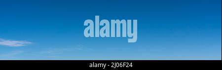 Panorama of blue sky with white foggy clouds Stock Photo