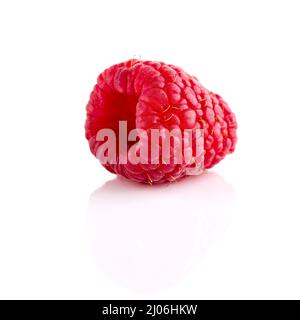 One ripe raspberry isolated on white backdrop Stock Photo
