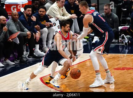 Washington, USA. 16th Mar, 2022. WASHINGTON, DC - MARCH 06: Washington Wizards center Kristaps Porzingis (6) pushes Denver Nuggets guard Monte Morris (11) out of the way to make a passage for guard Raul Neto (19) during a NBA game between the Washington Wizards and the Denver Nuggets, on March 16, 2022, at Capital One Arena, in Washington, DC. (Photo by Tony Quinn/SipaUSA) Credit: Sipa USA/Alamy Live News Stock Photo