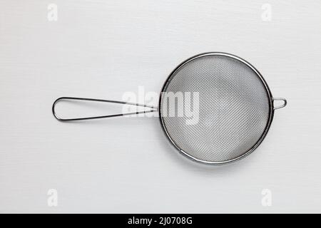 Stainless Steel Tea Strainer Kitchen Sieve With Handle White Background Stock Photo
