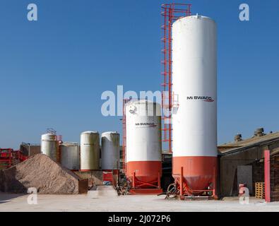 Storage tanks at Mi Swaco Minerals division, a Schlumberger company, Great Yarmouth, Norfolk, England, UK Stock Photo