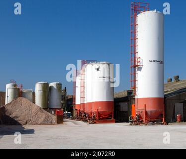 Storage tanks at Mi Swaco Minerals division, a Schlumberger company, Great Yarmouth, Norfolk, England, UK Stock Photo