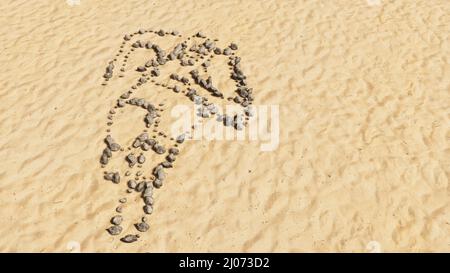 Concept conceptual stones on beach sand handmade symbol shape, golden sandy background, colorful runner sign. 3d illustration metaphor for athlete Stock Photo