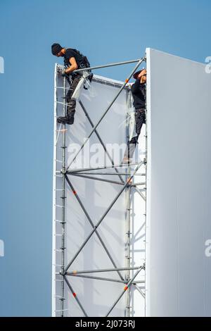 Dordrecht, Netherlands - April 15, 2019: Construction of a stage for the performance of The Passion. Scaffolders constructing scaffolding of temporary Stock Photo