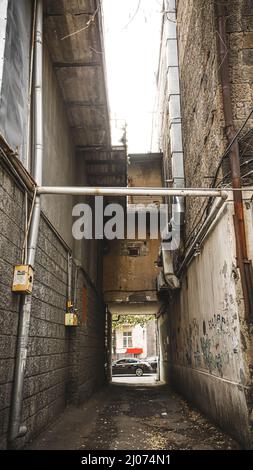 A vertical shot of a narrow passage between huge rocks Stock Photo - Alamy