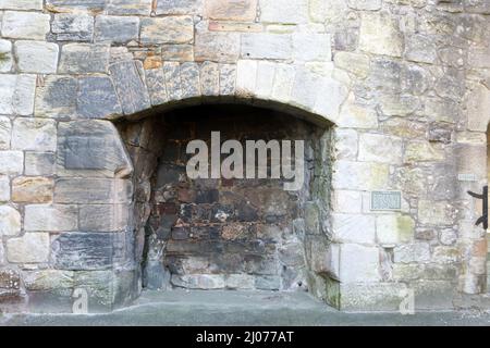 The Great Hall fireplace at Crookston Castle, a medieval castle in Glasgow, Scotland Stock Photo