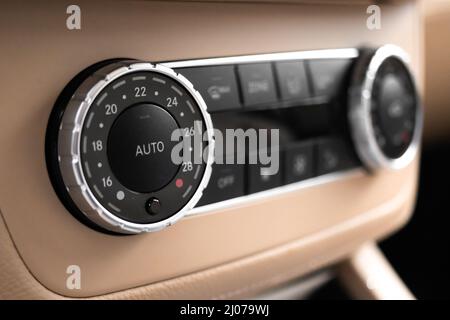 Climate control unit in the new luxury sport car close-up view photo Stock Photo