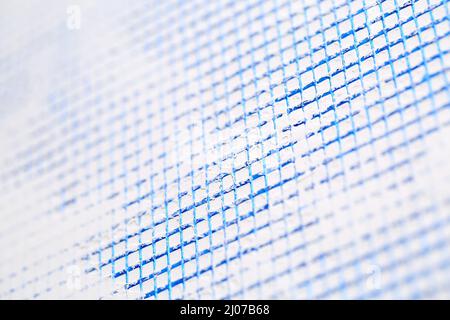 Close up of blue colored plastic (PVC) plastering mesh for reinforcing the first layer of a gypsum plaster on a wall. Construction and home renovation Stock Photo