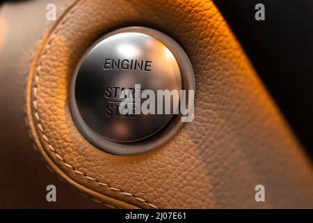 Engine start and stop button in luxury sport car close-up view photo Stock Photo