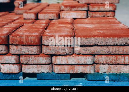 Colored paving slabs, paving stones for laying paths. Close up Stock Photo