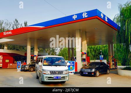 Beijing, China, Cars Driving in 'Total Sinochem' Service Gas Station, china capitalism Stock Photo