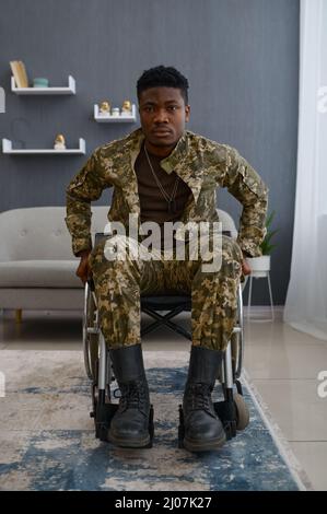 Portrait of young war veteran in wheelchair Stock Photo