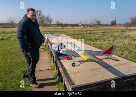 A radio controlled plane with the pilot. Stock Photo