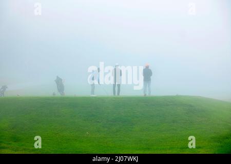 Crans Sur Sierre Golf Course with Fog in Crans Montana in Valais, Switzerland. *** Local Caption ***  golf,golfer,teeing off,person,sport,sportsperson Stock Photo