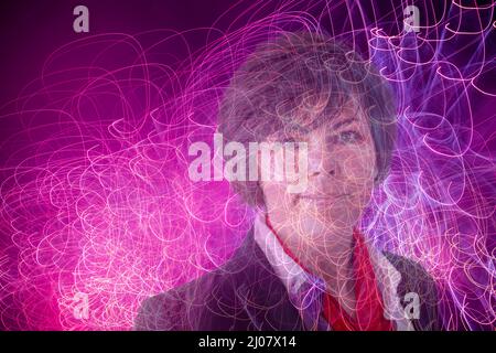 Woman With Light Effect in Switzerland. *** Local Caption ***  woman,headshot,portrait,digital composite,people,one person,only women,adult,adults onl Stock Photo