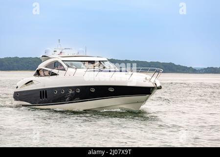 expensive yacht underway off North Haven, NY Stock Photo