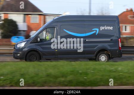 Amazon Prime Delivery Van Driving On The Road Panned Shot Showing Logo In The City Of Southampton Uk Stock Photo Alamy