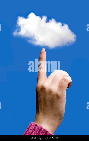 finger  holding or touching a cloud, data storage cloud computing concept Stock Photo