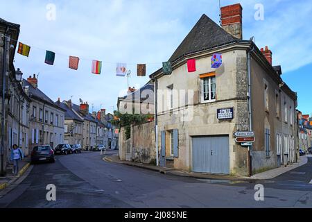 AZAY-LE-RIDEAU, FRANCE -24 JUN 2021- Street view of the village of Azay-le-Rideau, home of a landmark Renaissance castle, with suspended fabric lanter Stock Photo