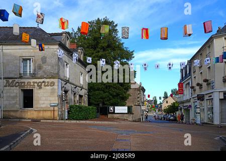 AZAY-LE-RIDEAU, FRANCE -24 JUN 2021- Street view of the village of Azay-le-Rideau, home of a landmark Renaissance castle, with suspended fabric lanter Stock Photo