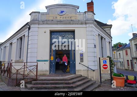 AZAY-LE-RIDEAU, FRANCE -24 JUN 2021- Street view of the village of Azay-le-Rideau, home of a landmark Renaissance castle, with suspended fabric lanter Stock Photo