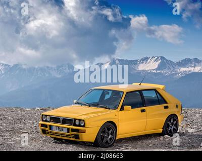 1995 Lancia Delta Integrale Evo II driving on historic Monte Carlo Rally stages and on the Route des Grandes Alpes  France. Stock Photo