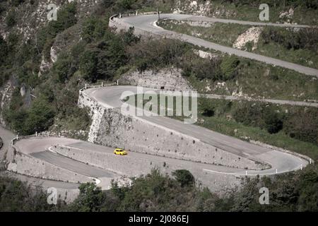 1995 Lancia Delta Integrale Evo II driving on historic Monte Carlo Rally stages and on the Route des Grandes Alpes  France. Stock Photo