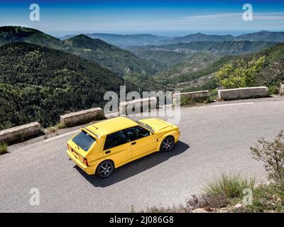 1995 Lancia Delta Integrale Evo II driving on historic Monte Carlo Rally stages and on the Route des Grandes Alpes  France. Stock Photo