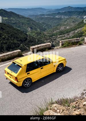 1995 Lancia Delta Integrale Evo II driving on historic Monte Carlo Rally stages and on the Route des Grandes Alpes  France. Stock Photo