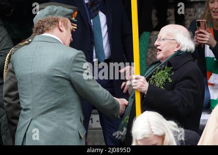 American-Irish actor John C. Reilly (left) and President Michael D higgins during the St Patrick's Day Parade in Dublin, which has returned in full, with crowds on the streets of Dublin after Covid-19 put a pause on celebrations for the last two years. Picture date: Thursday March 17, 2022. Stock Photo