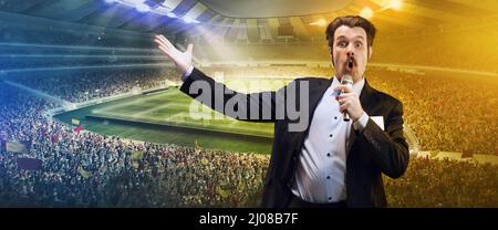 Proud man, professional sport commentator having online TV stream,  broadcasting football match isolated over stadium background Stock Photo -  Alamy