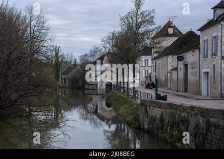 Chablis, France - February 23, 2022: Chablis is a town in the Bourgogne-Franche-Comte famous for its french white wine. Cloudy winter day. Selective f Stock Photo