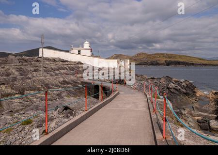Valencia Island lighthouse on the Atlantic coast of County Kerry, Ireland Stock Photo