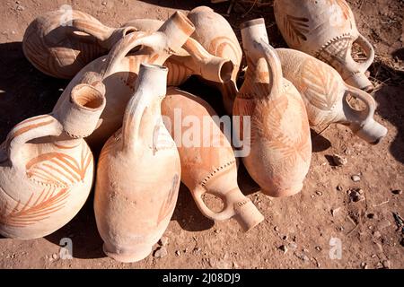 Traditional pottery being sold on a market in Morocco Stock Photo