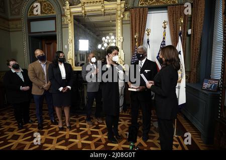 Washington DC, USA. 17th Mar, 2022. U.S. Vice President Kamala Harris (R) swears in Shalanda Young as Director for Office of Management and Budget in the Ceremonial Office at the White House on Thursday, March 17, 2022. Photo by Yuri Gripas/UPI Credit: UPI/Alamy Live News Stock Photo