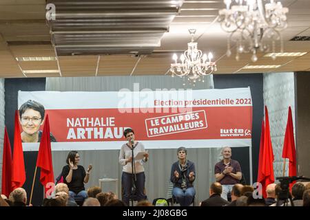 Marseille, France. 16th Mar, 2022. Nathalie Arthaud is seen on stage making her speech. Nathalie Arthaud, candidate to the French presidential election attends a meeting in Marseille. She gathered about 50 people. She represents the Trotskyist party Lutte Ouvriere. The polls credit her with less than 1% of the vote in the first round. Credit: SOPA Images Limited/Alamy Live News Stock Photo
