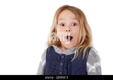 Oh my. Studio portrait of a surprised-looking little girl. Stock Photo