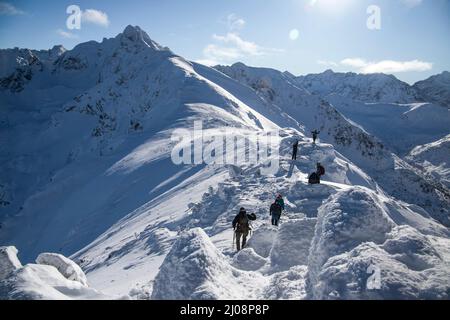 Tourist traffic in winter Tatra mountains in Poland Stock Photo