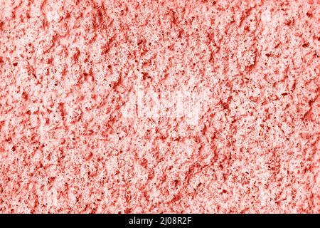 Coral decorative plaster texture on the wall Stock Photo